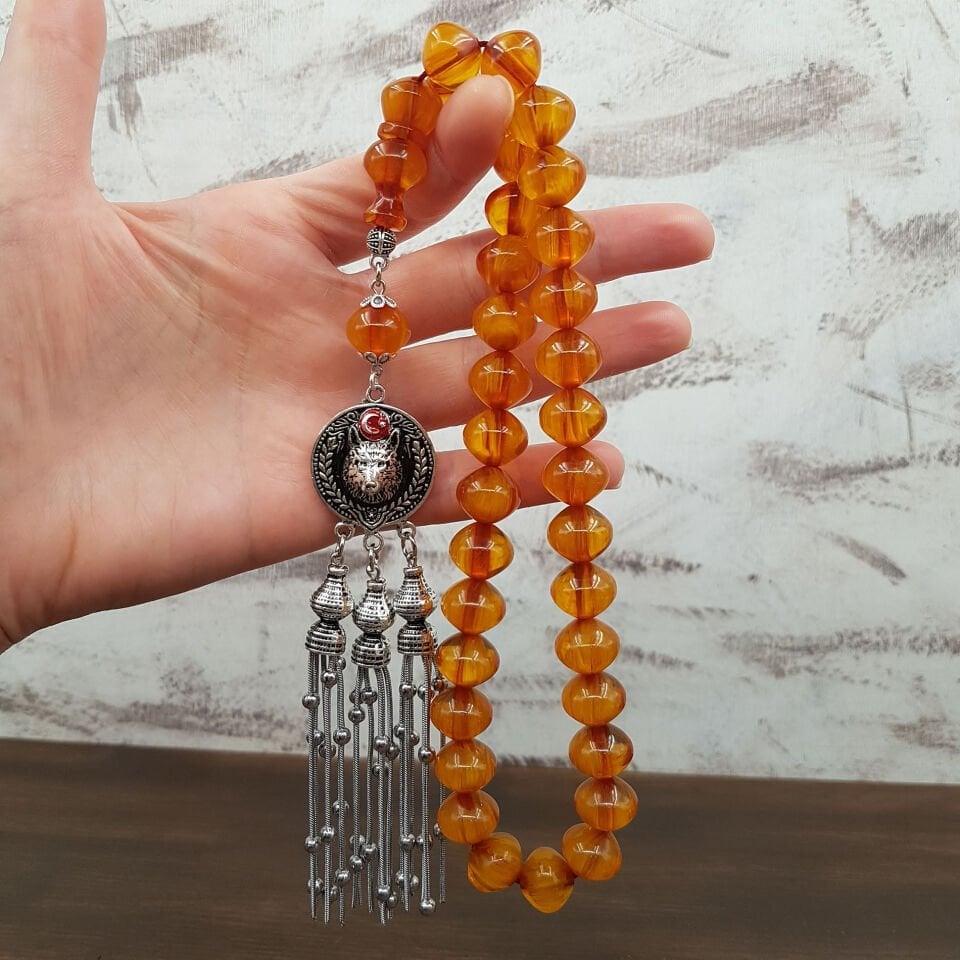 Büyük Boy Kurt Tasarım Sığırcık Sıkma Kehribar